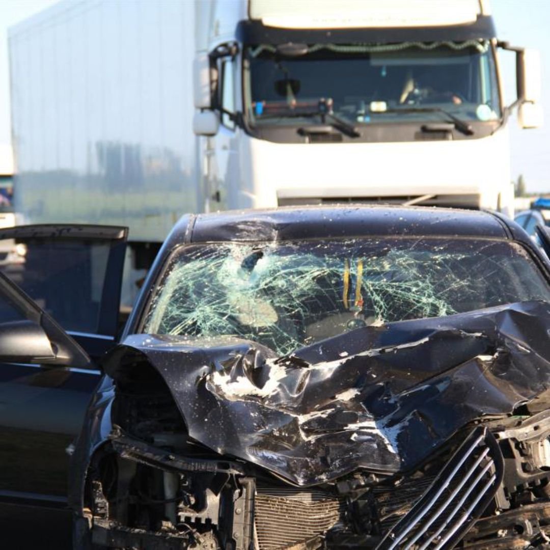 Damaged truck cab after a roadside incident