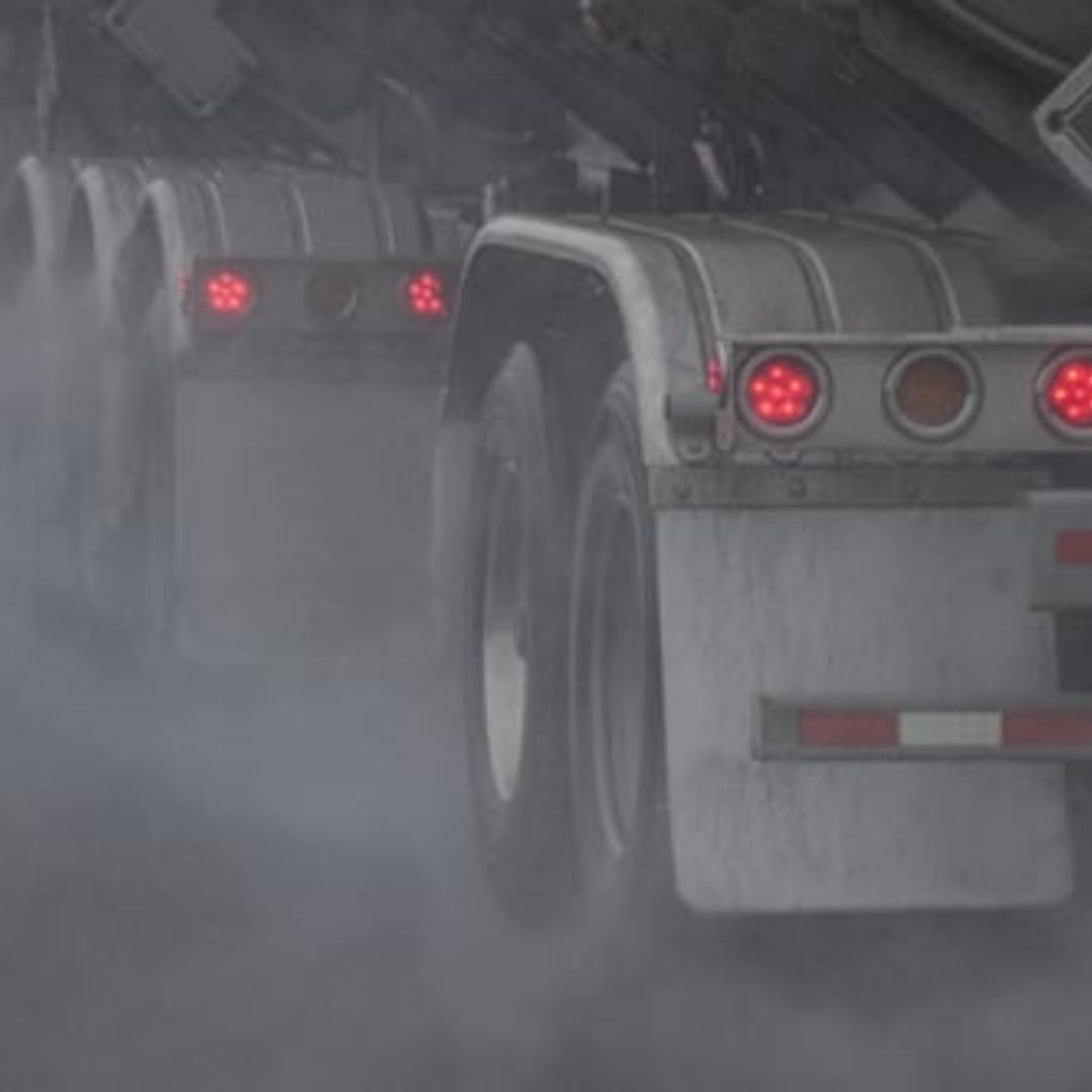 Rear of a truck on a misty road