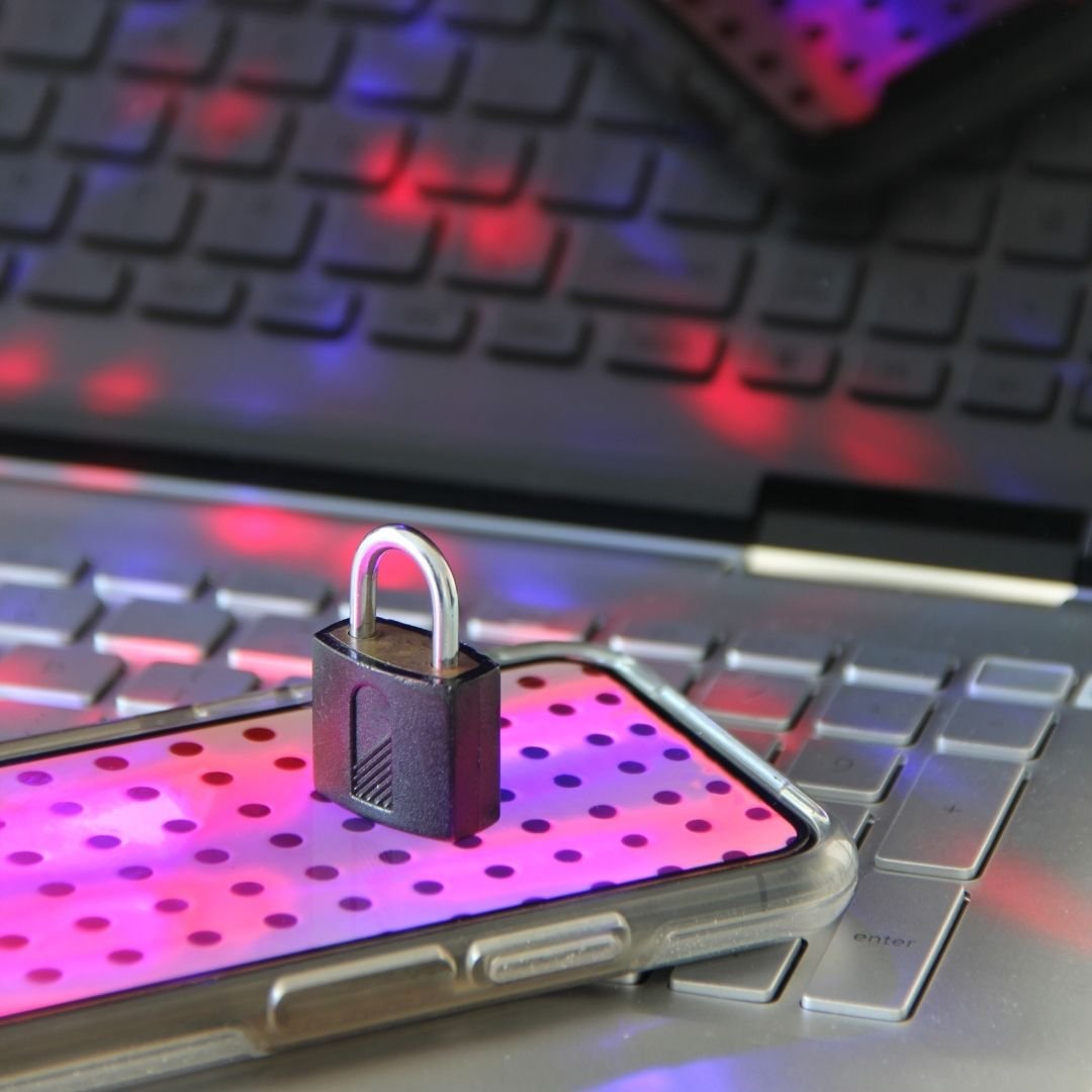 Padlock on a laptop keyboard representing secure data paths